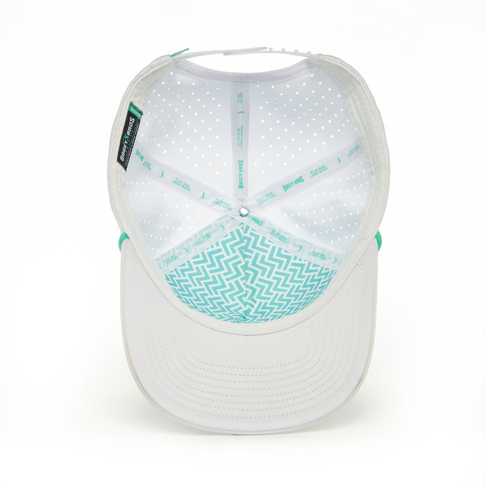 The Birdie Finger - Performance Golf Rope Hat - Snapback is a white cap shown from above, highlighting teal zigzag-lined perforated panels, a branded sweatband, and an adjustable snapback for comfort and fit.