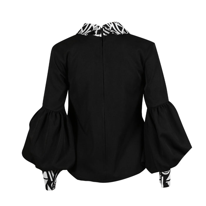 African print collar blouse, statement black blouse for women, FabroSanz heritage fashion, bold collar shirt, bishop sleeve blouse, Afro-modern women's fashion, designer African-inspired tops, powerful workwear for women