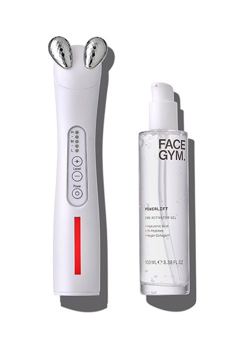a white device next to a clear bottle