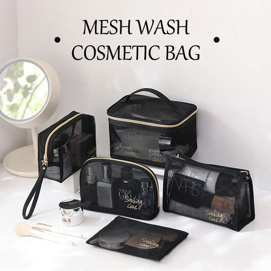 Set of black mesh wash cosmetic bags with visible branding on a white surface.