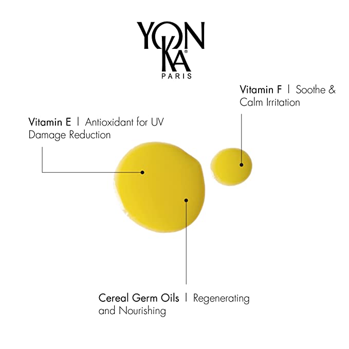 Close-up of yellow serum drops illustrating key ingredients Vitamin E for UV damage reduction, Vitamin F to soothe and calm irritation, and cereal germ oils for regenerating and nourishing in Booster Nutri+ | Yon-Ka Paris.