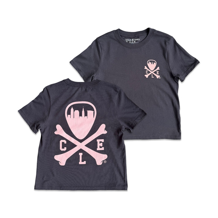 Two dark gray short-sleeve t-shirts shown on a white background, one displaying a large pink skull and crossbones graphic with the letters C, L, and E, and the other showing a smaller matching chest graphic.