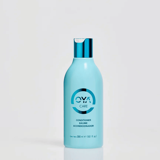 Bottle of Conditioner Rinse Out | OYA in light blue packaging with a shiny blue cap, designed for hair care and wellness.