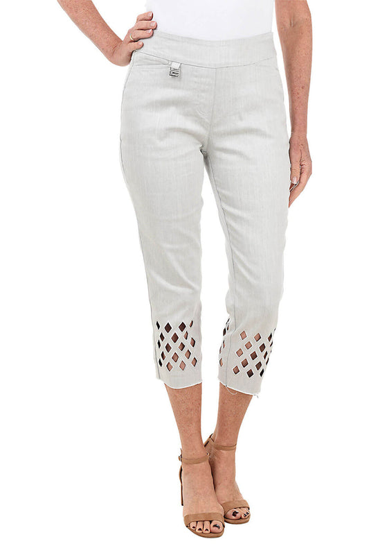 Light grey pants with cut-out details on a white background