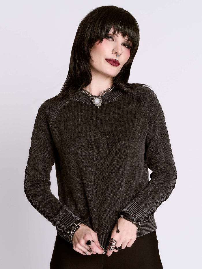 distressed braided sweater