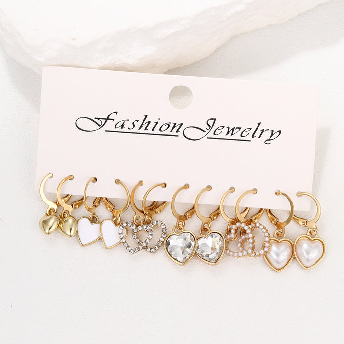 E1515 - Pearl hollow love earrings