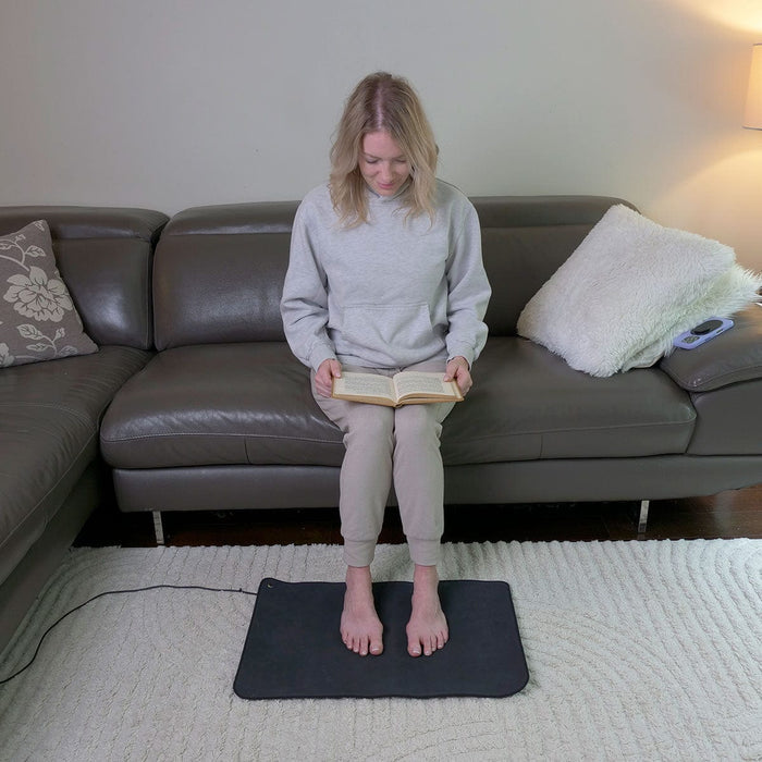 Earth2Body grounding mat with cord; conductive PU and graphene earthing mat; grounding mat with non-slip underside; compact grounding mat for home use; Earth2Body mat with 15 foot grounding cord; faux leather grounding mat