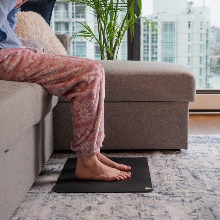 Earth2Body grounding mat with cord; conductive PU and graphene earthing mat; grounding mat with non-slip underside; compact grounding mat for home use; Earth2Body mat with 15 foot grounding cord; faux leather grounding mat