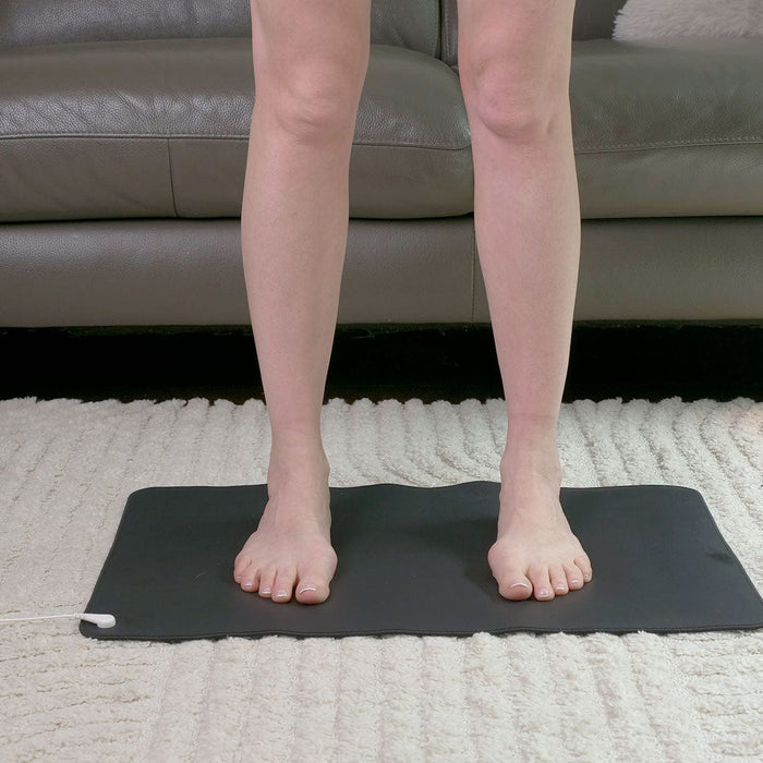 Earth2Body grounding mat with cord; conductive PU and graphene earthing mat; grounding mat with non-slip underside; compact grounding mat for home use; Earth2Body mat with 15 foot grounding cord; faux leather grounding mat