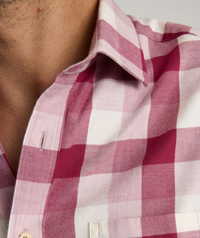 Model is wearing UNTUCKIt Greenwald Flannel in pink.