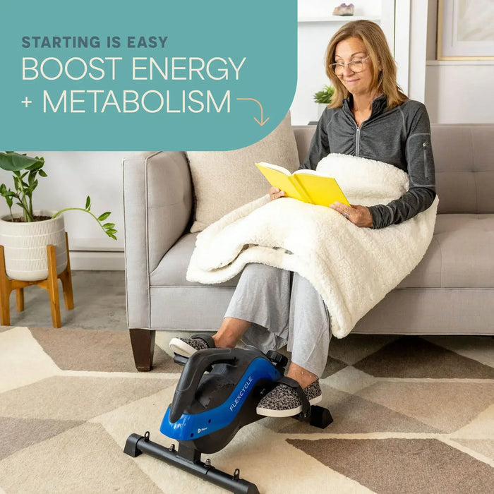 Infographic reading 'Starting Is Easy: Boost Energy + Metabolism' next to a woman relaxing under a blanket while pedaling the FlexCycle Plus.