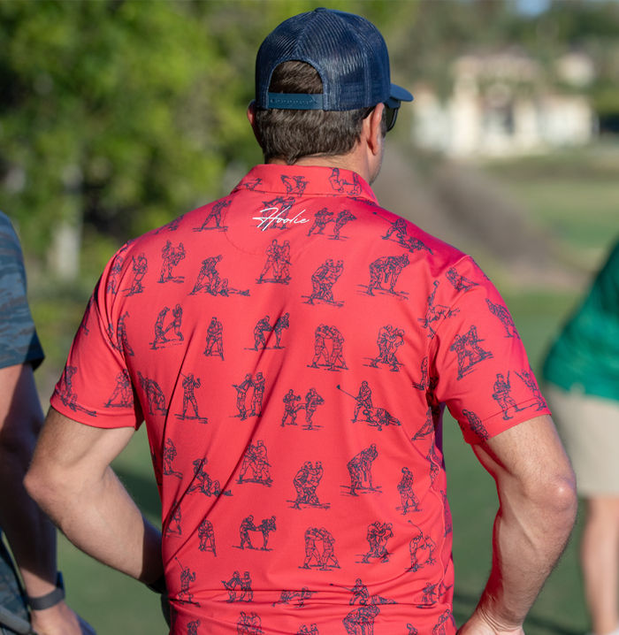 Performance Men's Golf Polo in Red with fighting manual spoof graphics
