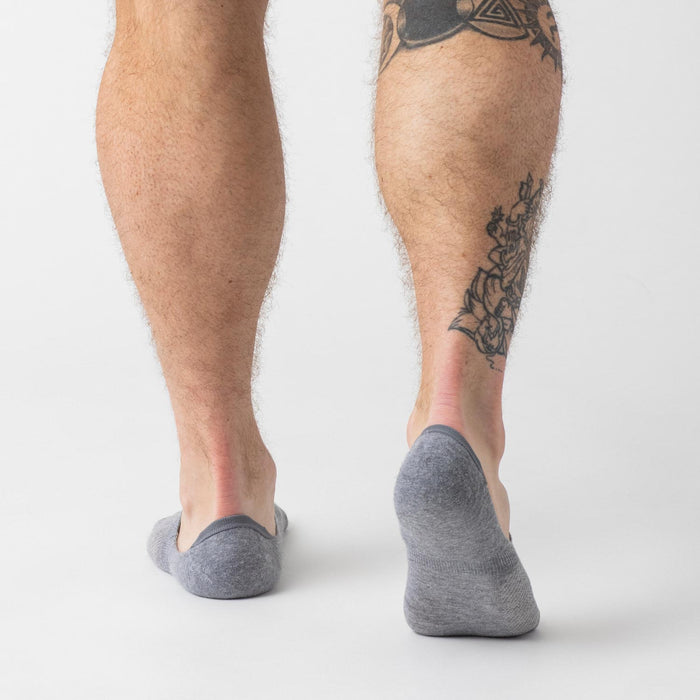 Heather Gray Never Show Socks on tattooed and untattooed calves.