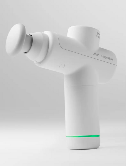 White handheld massage device with a rounded attachment and green light ring near the base, designed for muscle recovery and relaxation, named Hypervolt Go 2 | Hyperice.