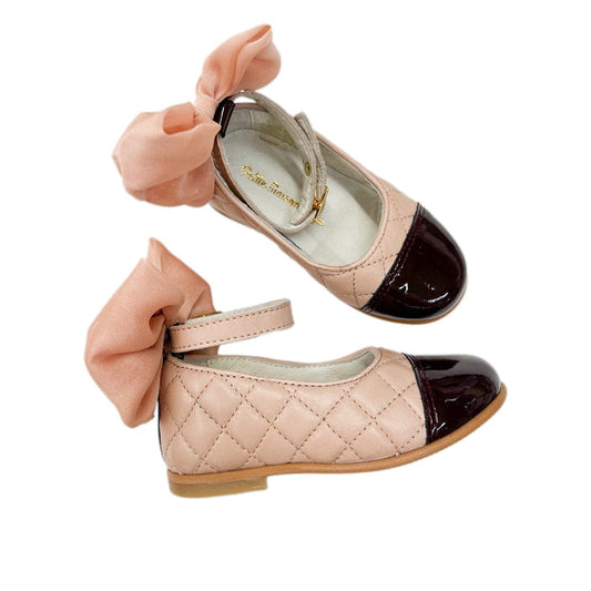 Blush quilted Mary Jane shoes for girls featuring glossy patent cap toe, ankle strap with gold buckle, and oversized dusty pink bow detail.