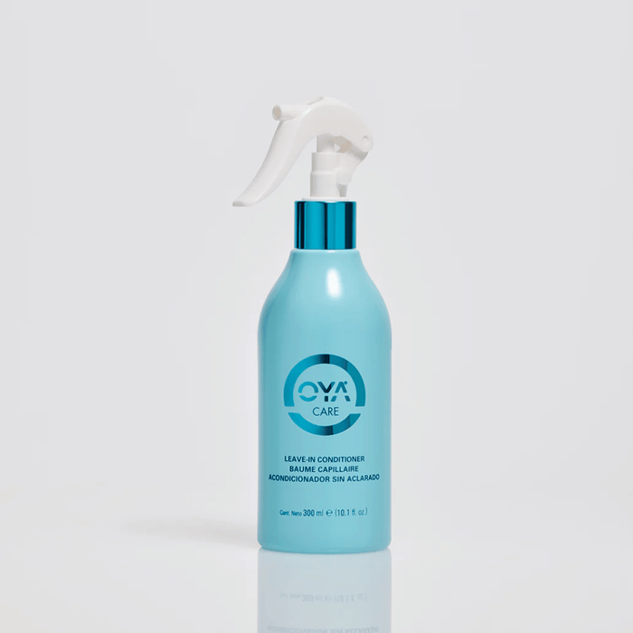 Blue spray bottle of Leave-in Conditioner | OYA with a white trigger nozzle, designed for hair care and moisturizing.
