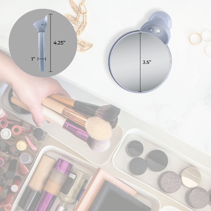 Zadro FC30L 705004417938 environment photo front view on makeup table with dimensions, lighted compact travel mirrors with magnifications & suction cup in front of a real life setting