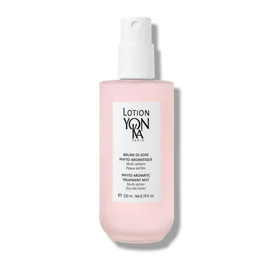 Bottle of Lotion YON-KA PS | YON-KA with pink liquid and white spray cap, designed for skincare and body care targeting dry skin with multi-action treatment.