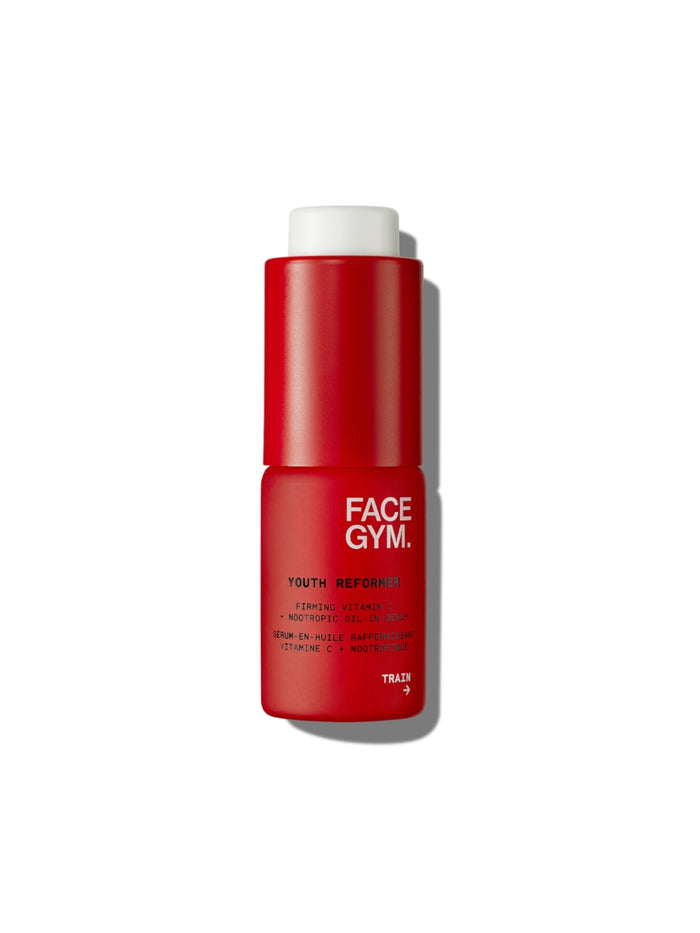 a red bottle with white cap