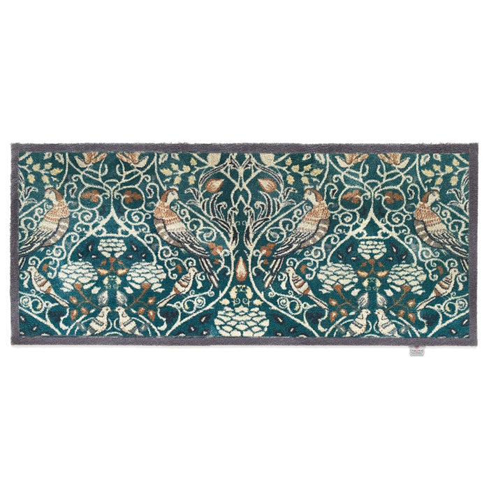 Nature 25 Washable Runner- a 100% recycled cotton runner featuring birds in off-white, beige, brown, and black among foliage.