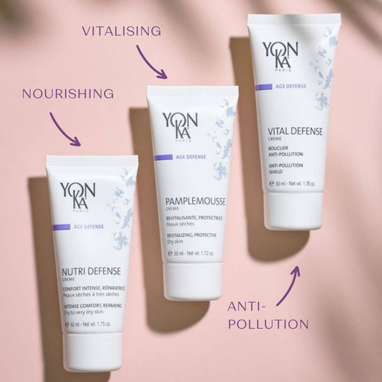 Nutri Defense Creme | Yon-Ka Paris skincare tube displayed with two other tubes on a soft pink background, highlighting nourishing, vitalising, and anti-pollution benefits.