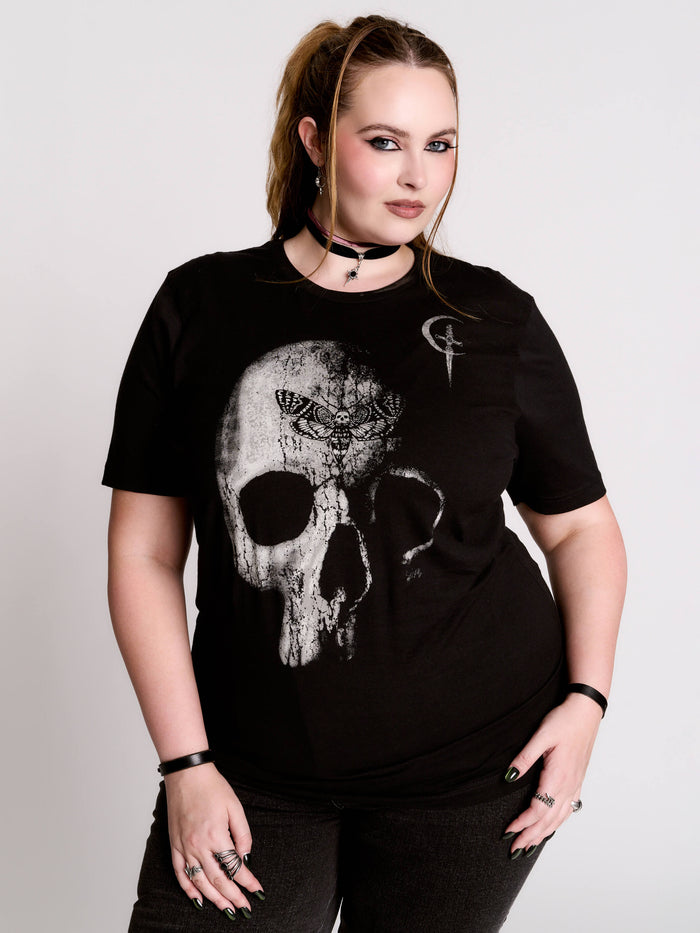 A black t-shirt with a large white skull graphic on the front.