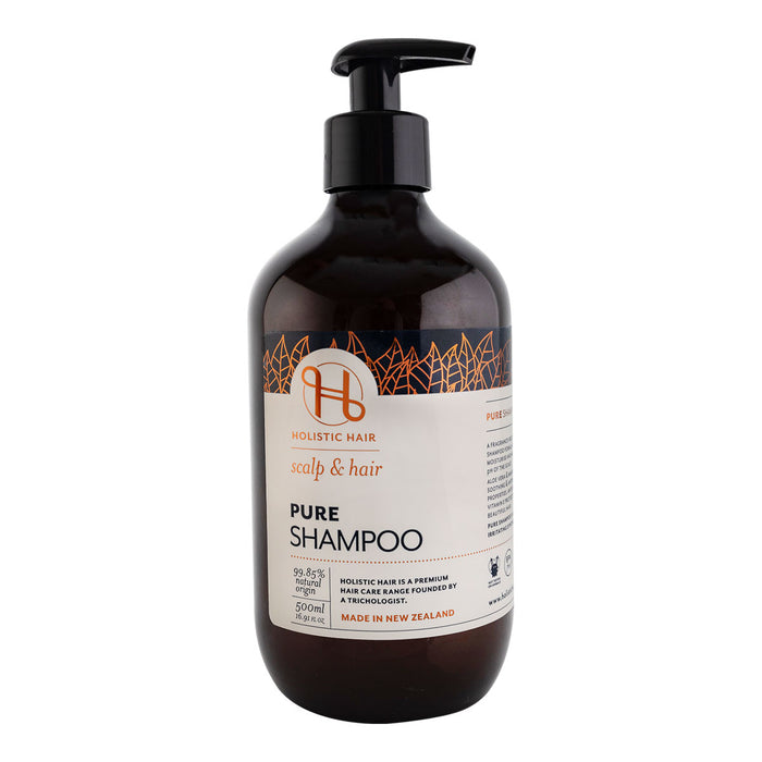 Bottle of Holistic Hair pure shampoo on a white background