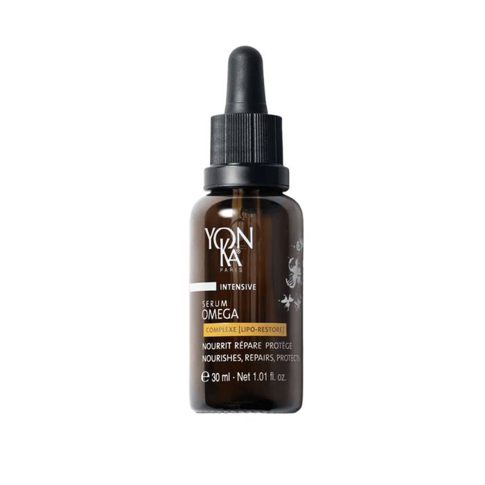 Brown glass dropper bottle of Serum Omega | Yon-Ka Paris skincare product designed to nourish, repair, and protect the skin with a restorative complex.