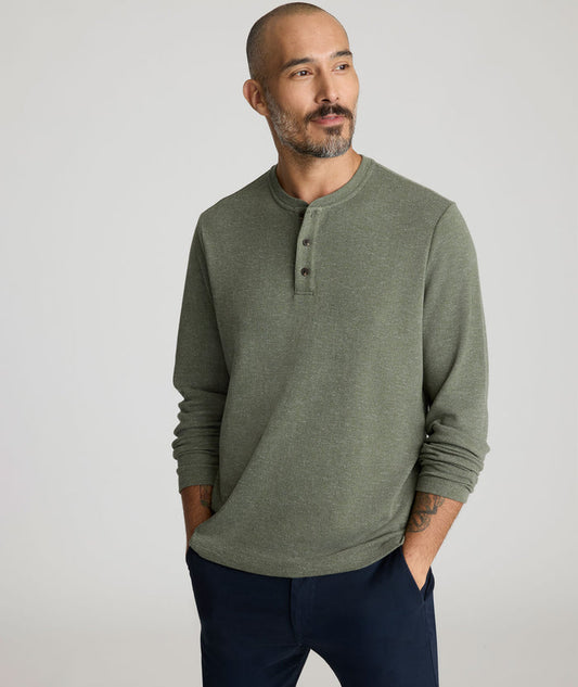 Model is wearing UNTUCKit Harrow Herringbone Henley in Beetle.
