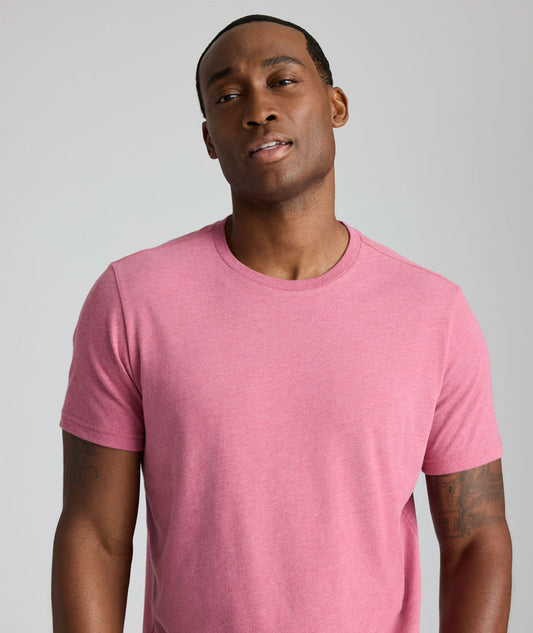 Model is wearing UNTUCKit Saxum tee in solid rose wine.