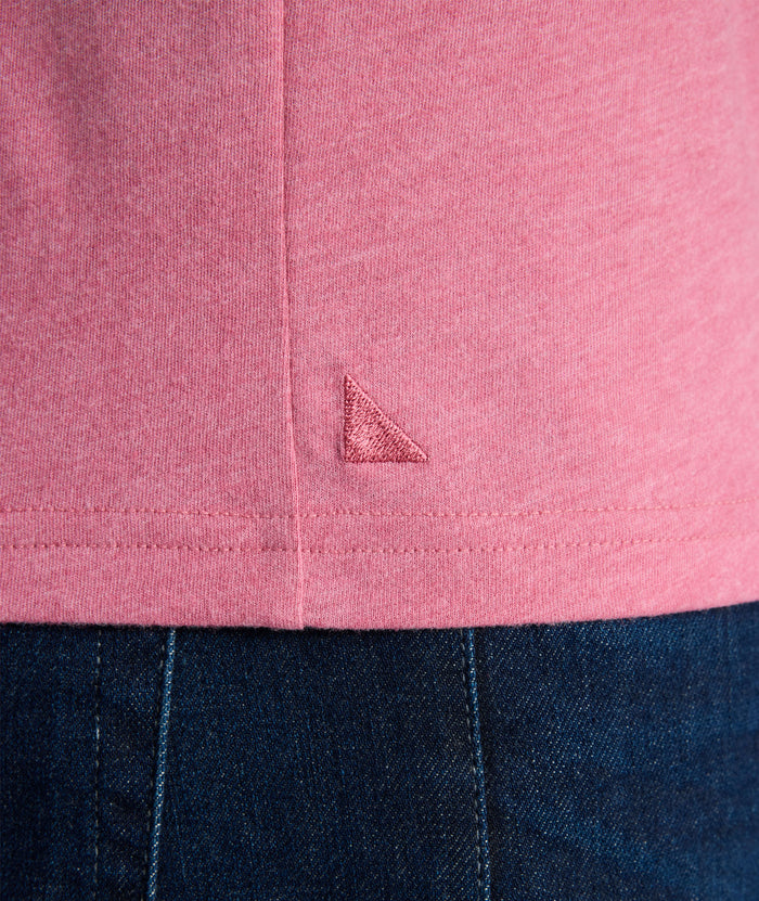 Model is wearing UNTUCKit Saxum tee in solid rose wine.