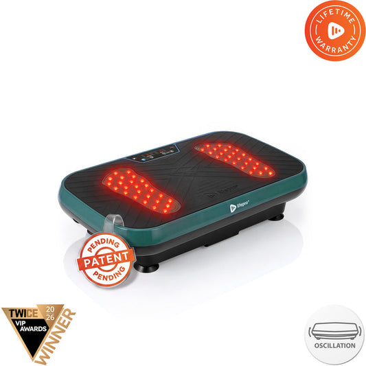 VibraRed vibration plate in jade green with red light therapy LEDs glowing in footprint shapes, Patent Pending badge, TWICE VIP Awards 2026 Winner badge, and a Lifetime Warranty badge.