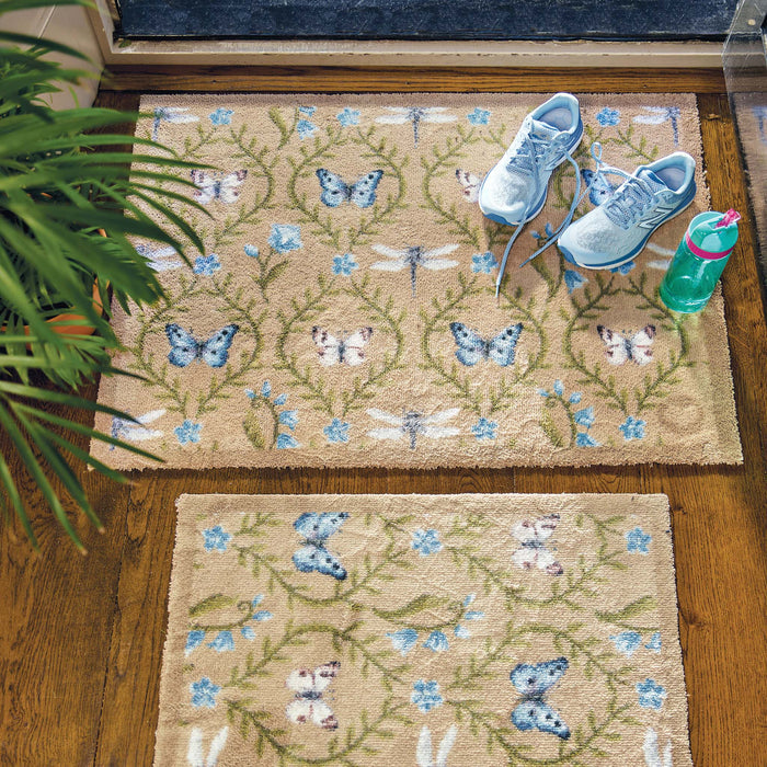 Wild Meadow Beige Green Doormat made from 100% recycled cotton featuring a meadow inspired pattern.